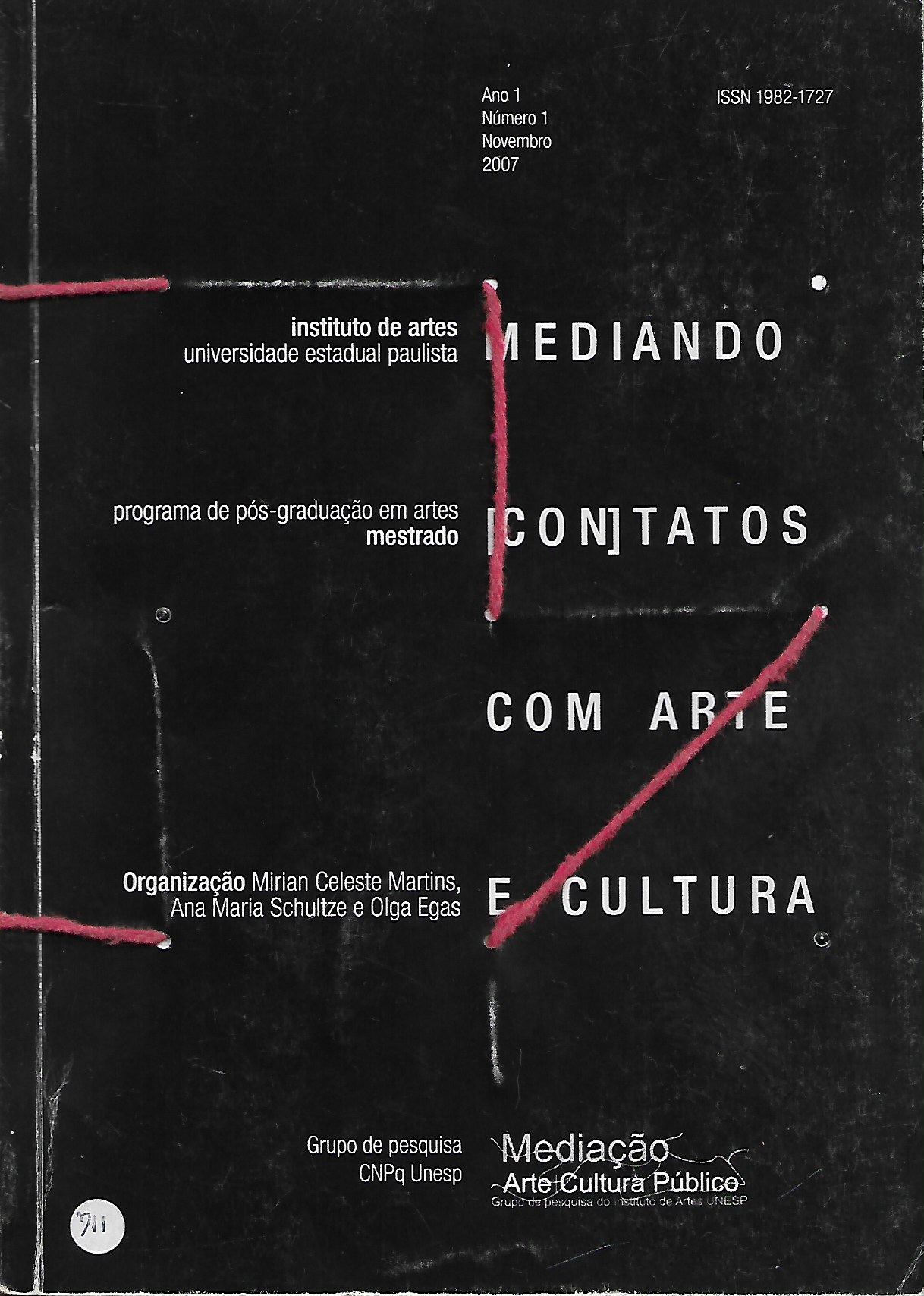 capa da revista em preto com texto em branco no meio, junto com outras informações.